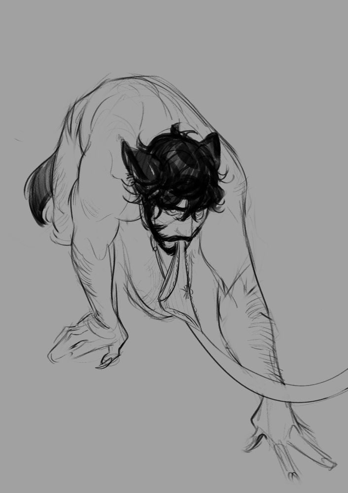 Angus crawling on the ground with his wolf ears and tail out for the world to see! He’s also on a leash and carrying panties in his mouth.