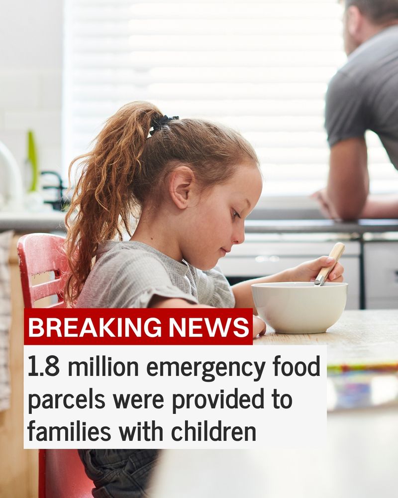Photo of a young child sat at a kitchen table eating a bowl of cereal. A dad stands in the background, he appears stressed. Text on top reads: Breaking news. 1.8 million emergency food parcels provided to families with children.