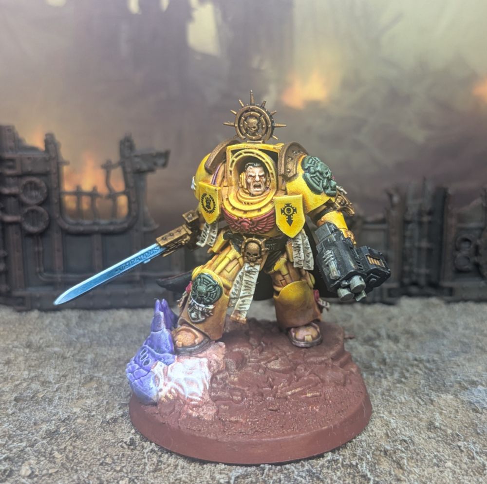 Imperial fist captain in terminator armour.