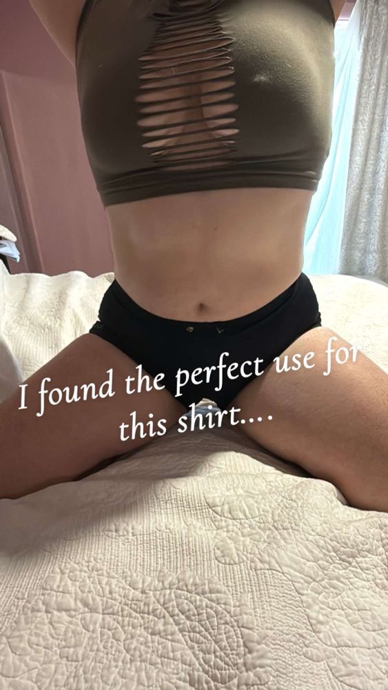 The perfect use for crop top shirt that is cut down the middle making the perfect frame for boobs!
