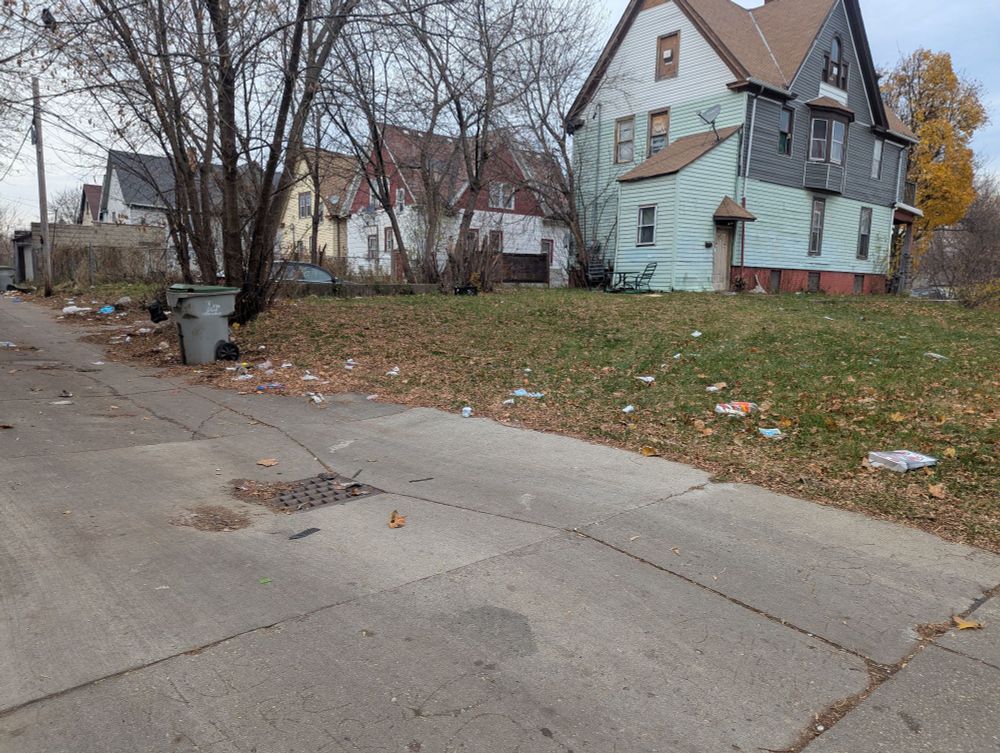 Trash stream threw along alley and yard
