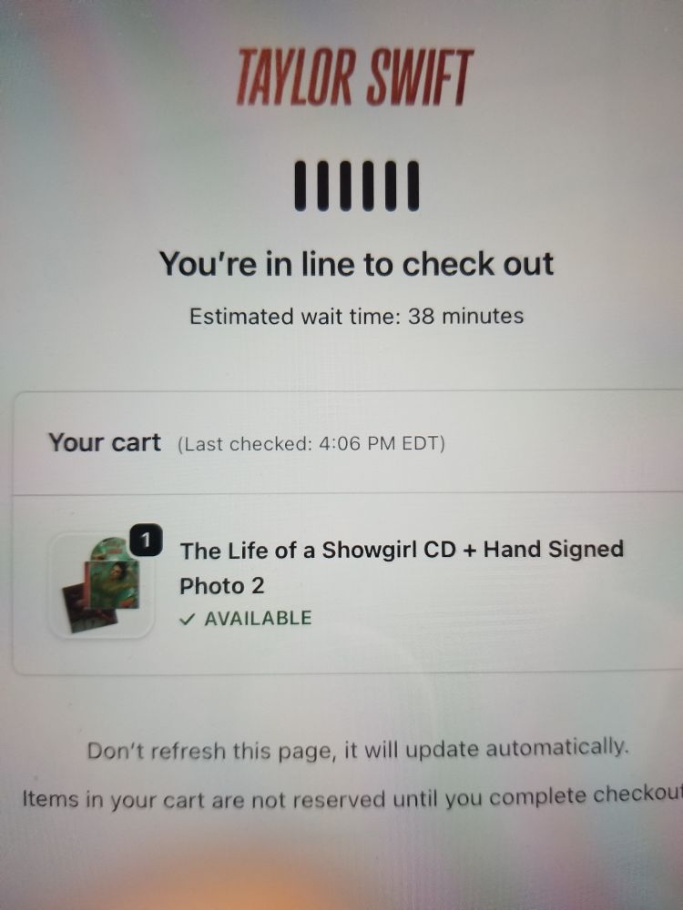 Taylor swift shop checkout screen. Estimated wait time 37 minutes