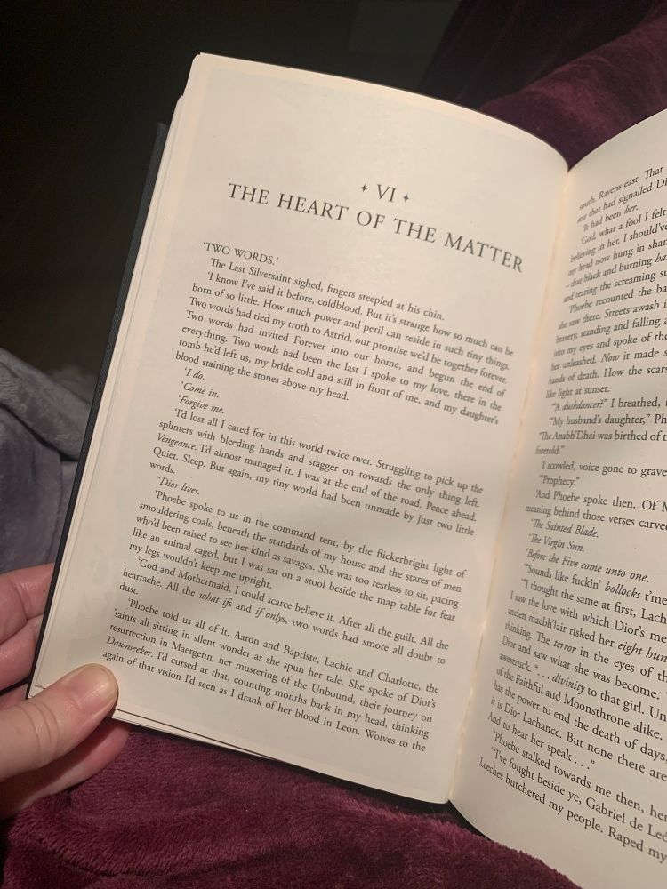 An opened book in my lap. Chapters Title: “The Heart of the Matter”