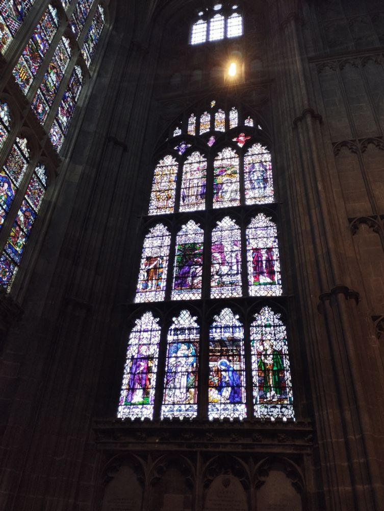 A ca 1900 stained glass window depicting archangels (best one is Uriel in top left) 