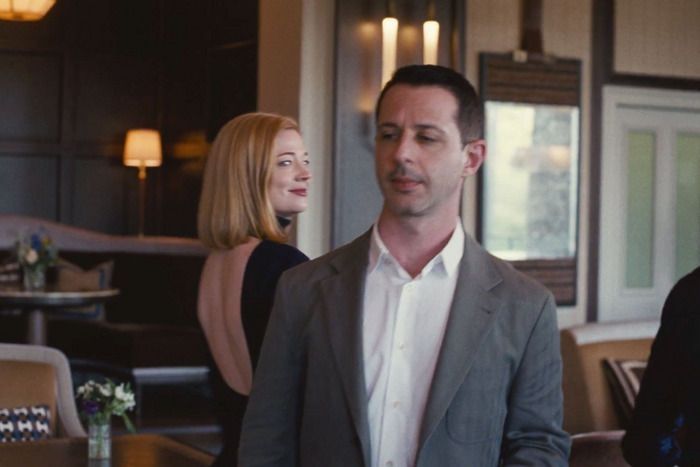 Shiv and Kendall Roy. Shiv is smirking over her shoulder in a ludicrously sexy backless dress. It isn't the most flattering shot of Kendall but he's still a cocky little fuck who's got it and knows it.