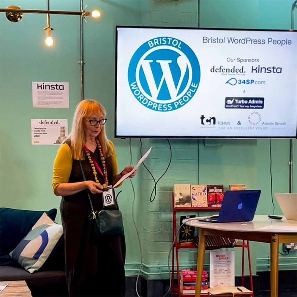 Janice begins the proceedings with a slide showing all the sponsors that helped us out; defended.net, Kinsta, 34SP, Turbo-Admin, The Curious Network & Atomic Smash