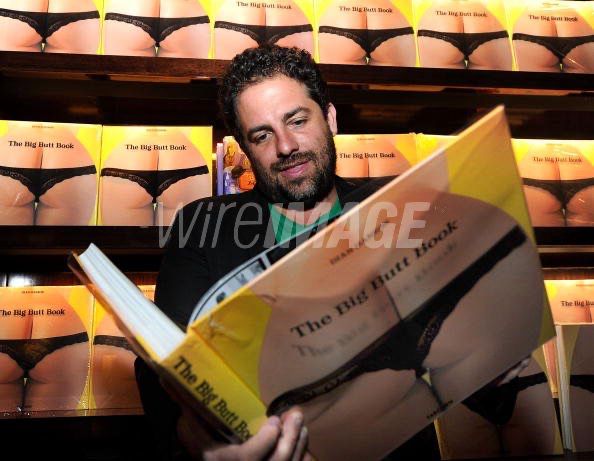 Bret Ratner reading the big butt book.
