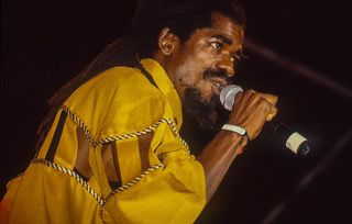 The late Cocoa Tea on stage in Jamaica early 90s Credit - Jason Burgess