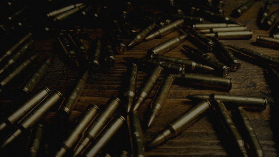 A panning shot of a table of bullets with the text "Syndication: A BNHA Mafia and Crime Reverse Bang" and "Interest Check opens in 1 week" beneath it.