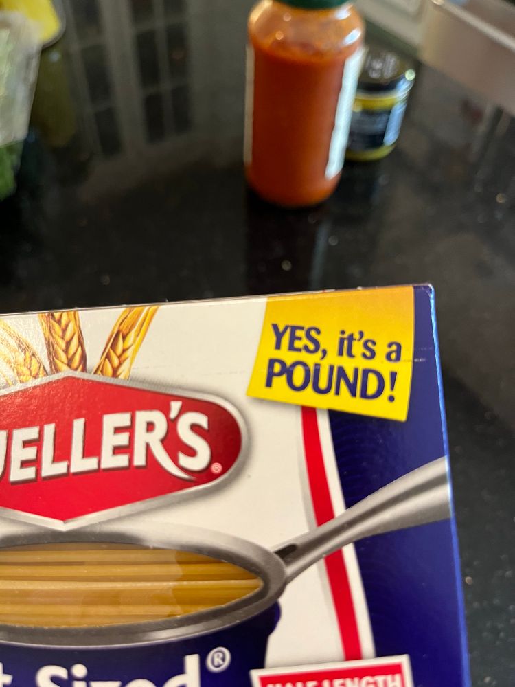 blurb on the corner of a box of Mueller’s spaghetti noodles that says “YES, it’s a POUND!”