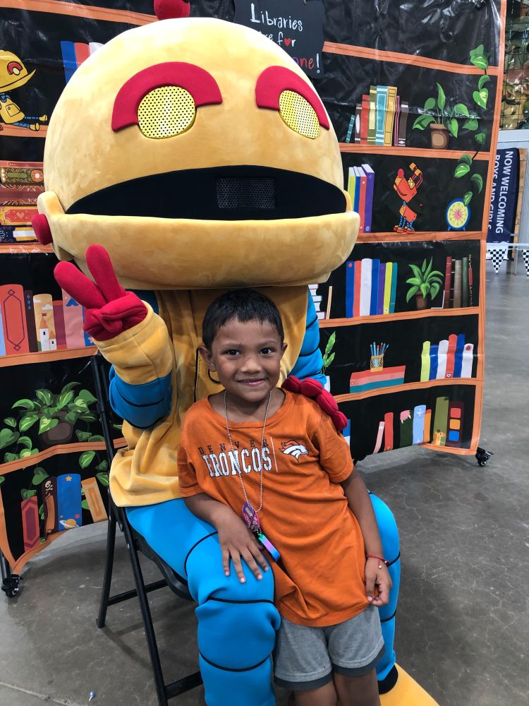 yesbot mascot with child