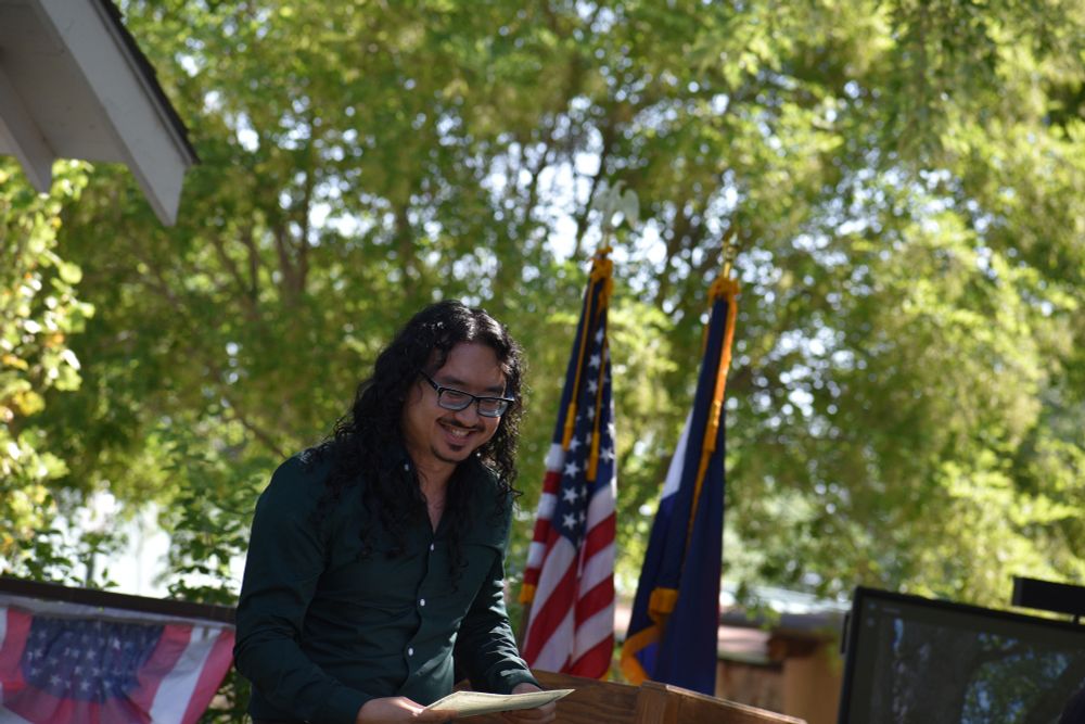 person receiving citizenship papers
