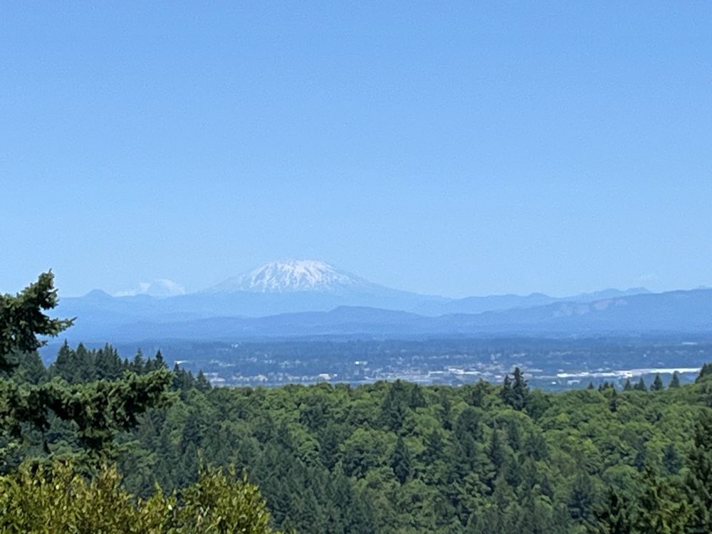 Mt St Helens and Mt Rainier. Photo taken from Portland, OR