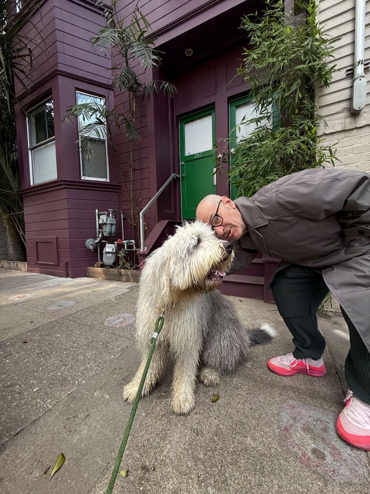 With Old English Sheepdog on SF sidewalk 