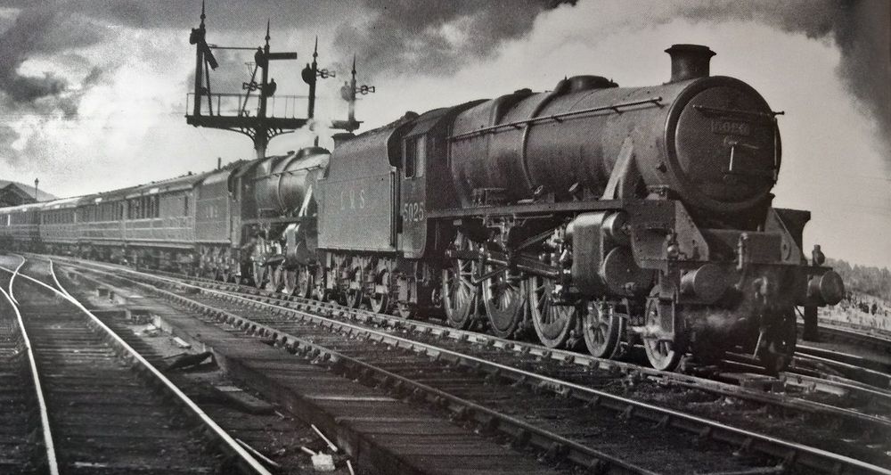 LMS 5P5F 4-6-0s No. 5024 & 5025 wait to leave Aviemore with a train of LNER stock (a special prehaps) in or around 1935. No. 5025 is preserved today at the Strathspey Railway, which is also in Aviemore.

