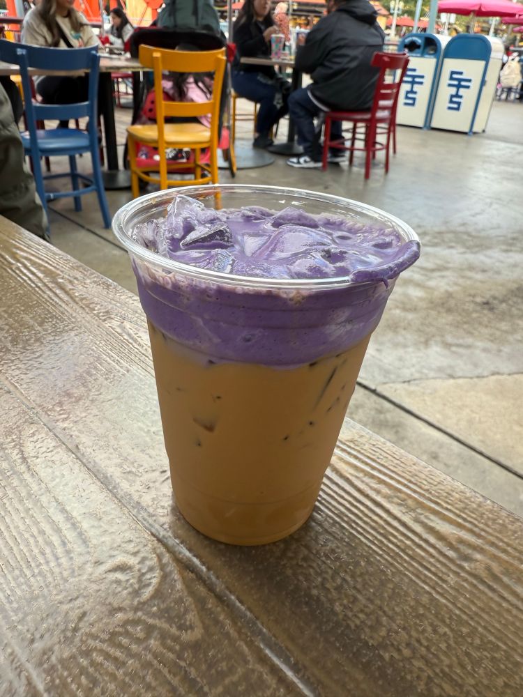 A picture of the taro Vietnamese coffee on a table at Disney California adventure 