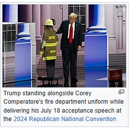 picture of trump at GOP 2024 convention standing next to Corey Comperatore's fire department uniform while giving his speech