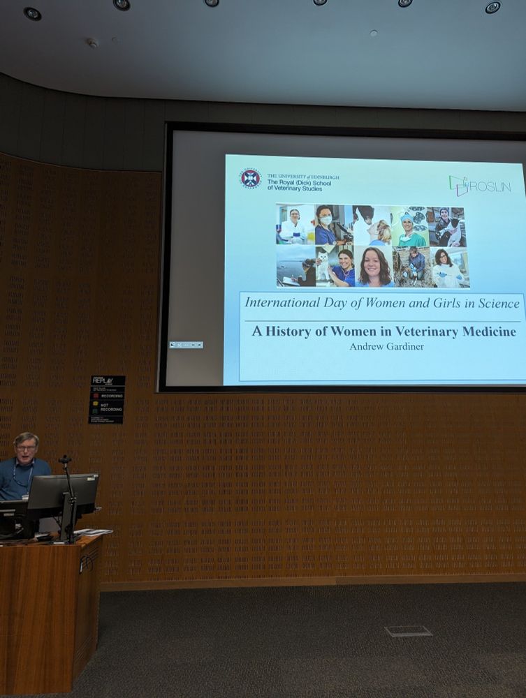 A slide presented in an auditorium about "A history of women in veterinary medicine"