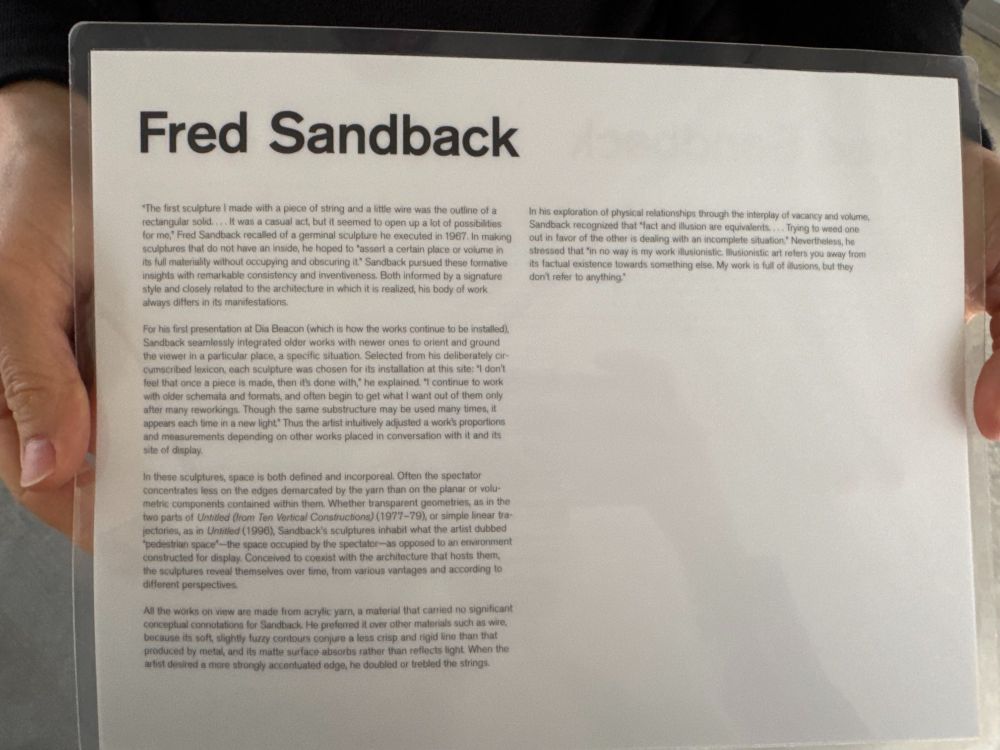 Laminated handout from Dia: Beacon museum about Fred Sandback (see next image for text). 5 paragraphs of text.