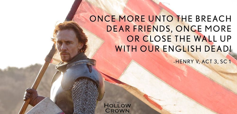 Screenshot from "The Hollow Crown" featuring Tom Hiddleston as King Henry V. In this pic he is holding a shield and the national flag of England.