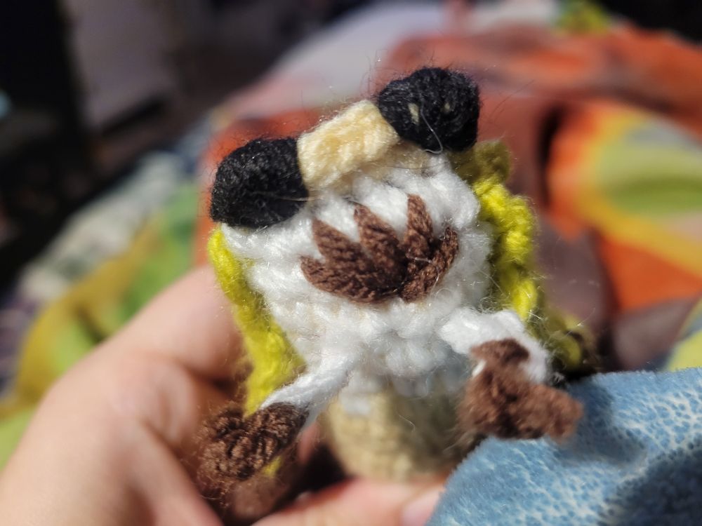 Crocheted cicada face
