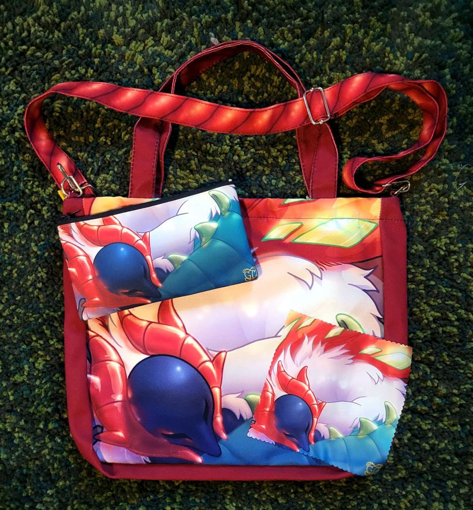 Matching messenger bag, zipper bag, and cleaning cloth set featuring the Pokemon Slither Wing