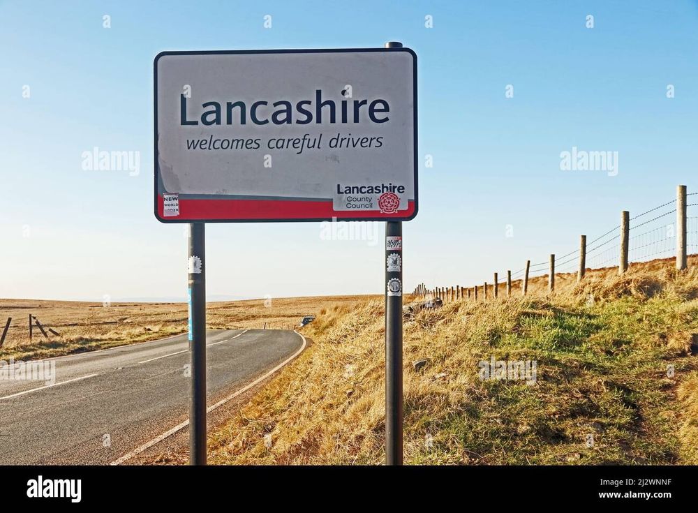 Road sign saying "Lancashire welcomes careful drivers"