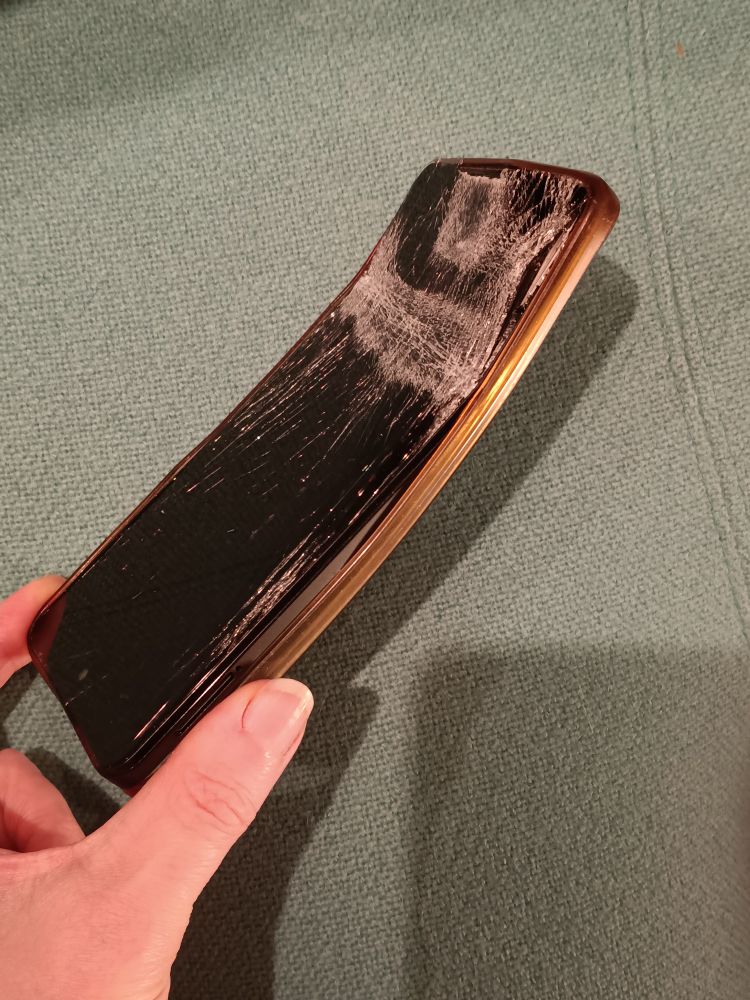 My mangled, smashed up bendy phone.