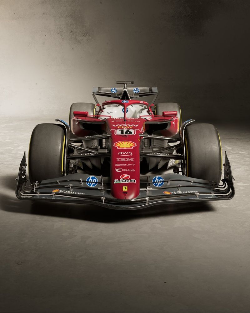 Front view of the SF-25 with a black front wing, and dark red nose, reminiscing the colour used as tribute for the 50th anniversary of Niki Lauda's world championship, and the 1975 world constructor championship with Ferrari 