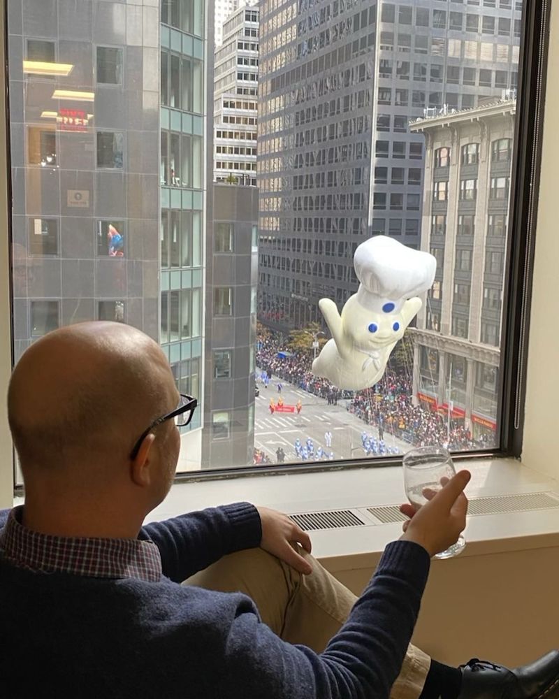 watching the Pillsbury Doughboy balloon menace the citizens of New York