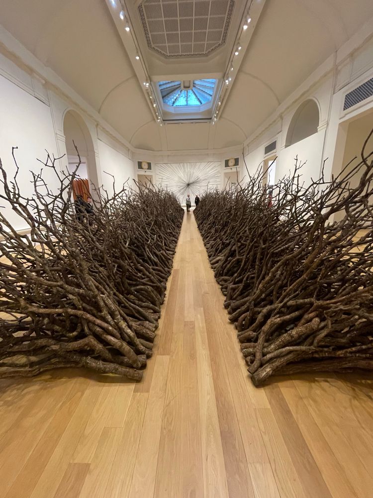Oak Passage: dead oak branches, arranged to create a ruler straight geometrical aisle on the inside and a wild tangle externally. 