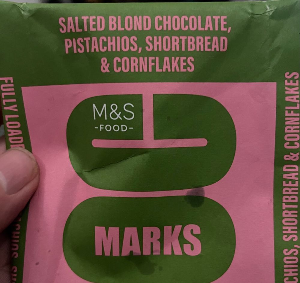 Chocolate bar wrapper: M&S Salted Blond Chocolate, Pistachios, Shortbread & Cornflakes. 