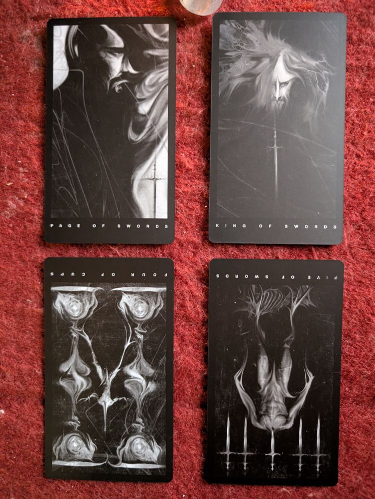Page of swords, king of swords, four of cups r. Five of swords r.