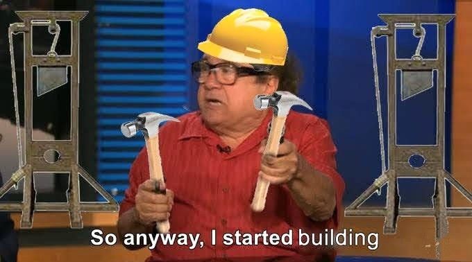 crudely built reaction meme of frank reynolds in a hard hat, holding two hammers with guillotine on either side of frame 

caption: "so anyway, I started building"
