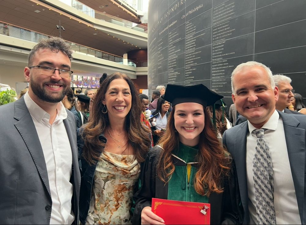 Me and my family. I’m in classic green medical graduation regalia. 