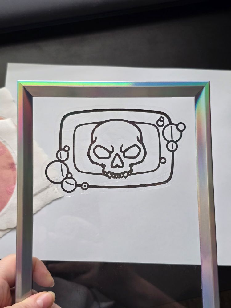 Ghoap suncatcher. Soap bar with bubbles and a Ghost skull in the middle on a white background.