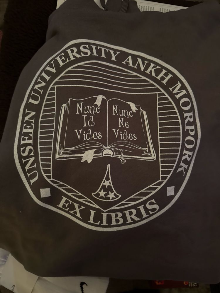 Discworld hoodie with the Unseen University logo