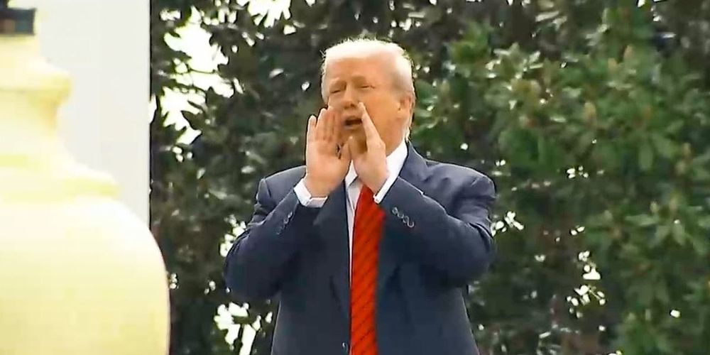 President Donald Trump shouted from the White House roof to reporters asking questions on the ground in a bizarre impromptu press conference.While apparently surveying the site for a new White House b...