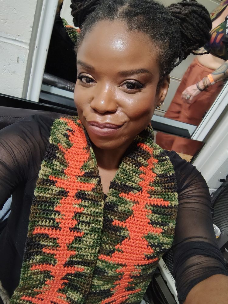 Mizeyesis Jungle and Drum and Bass DJ and music producer, co-owner and US Lead of DNB Girls Collective, with releases on Repertoire, Omni Music, Hangry Records, Monochrome, Yeska Beatz, Elm Imprint and more! Wearing an Amen break scarf after my headline set at Unity in Grand Rapids - Sept 2025 