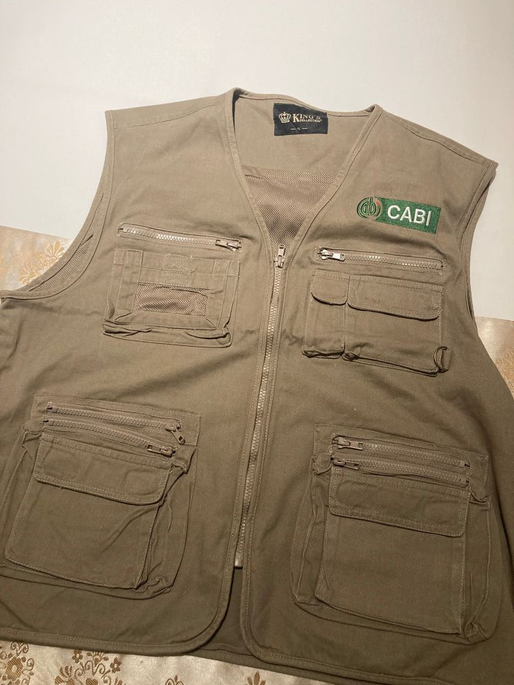 Vest/ Waistcoat with lots of pockets bearing the CABI logo