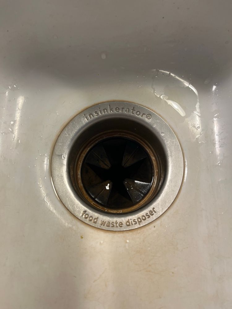 a picture of a garbage disposal (insinkerator)
