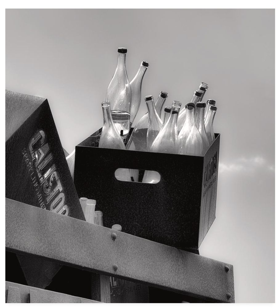Black and white photo of glass bottles from Calistoga Sparkling Water.  The area around Calistoga California is known for its hot springs, mud baths, world class restaurants, and amazing Napa Valley wines. It also has some great sparkling water.
