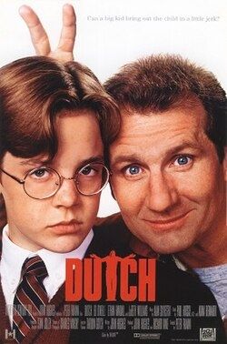 Dutch (1991).  Ed O'Neill and Ethan Embry.