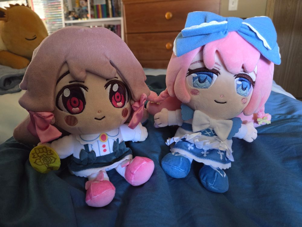 Plushies of Goldia and Harpae from Pocket Mirror