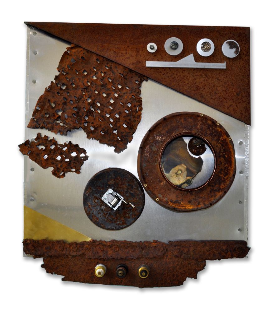 Found object wall-hanging: Plywood wrapped with aluminum flashing and flue tape, decorated with rusted metal, agate slab, vintage insulators, a piece of a brass sheet, aluminum circles, some watch innards, and a music box part that plays "It's a Wonderful World"