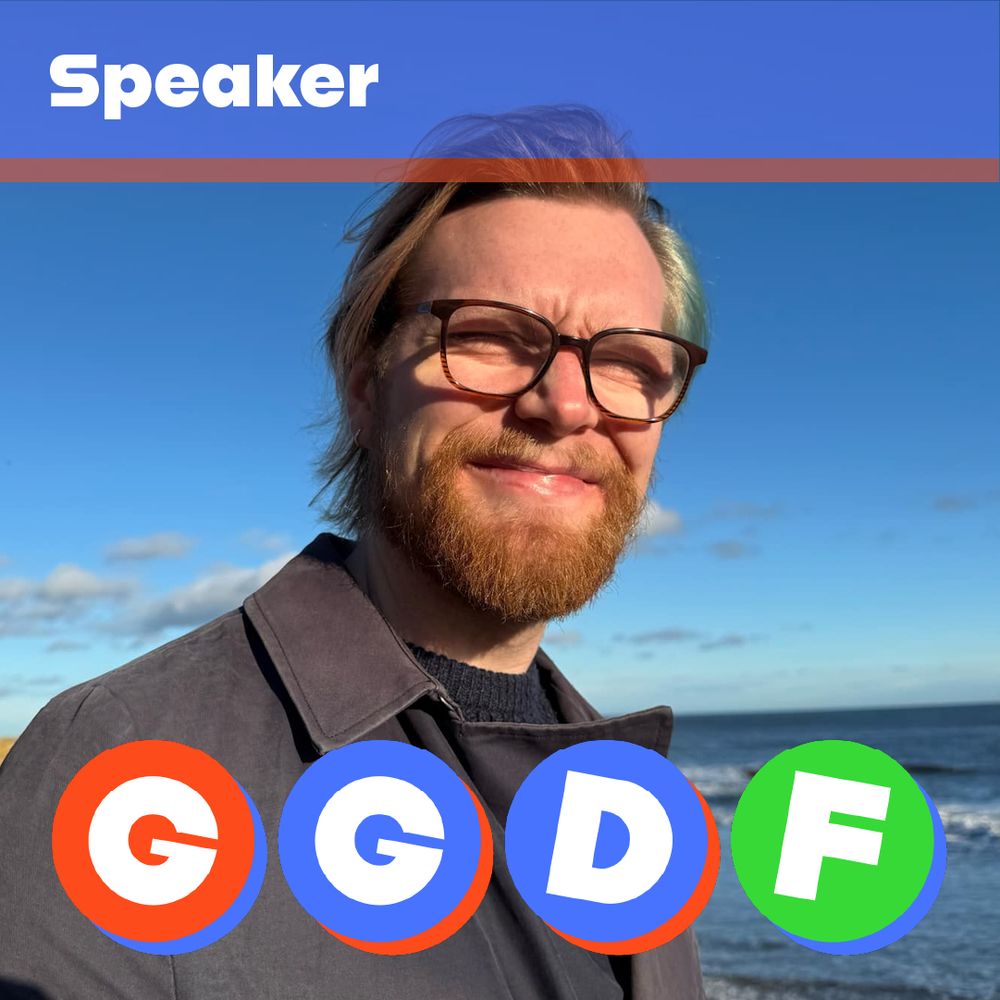 A photo of me, Jacob Mills, squinting against the sun, with the word 'Speaker' at the top and 'GGDF' along the bottom (that stands for Good Game Dev Fest)

I am a white dude with a ginger beard and glasses. In the photo I'm stood in front of the ocean and looking a little windswept, and a the time of the photo i had a slight blue tinge in my medium length blond hair.