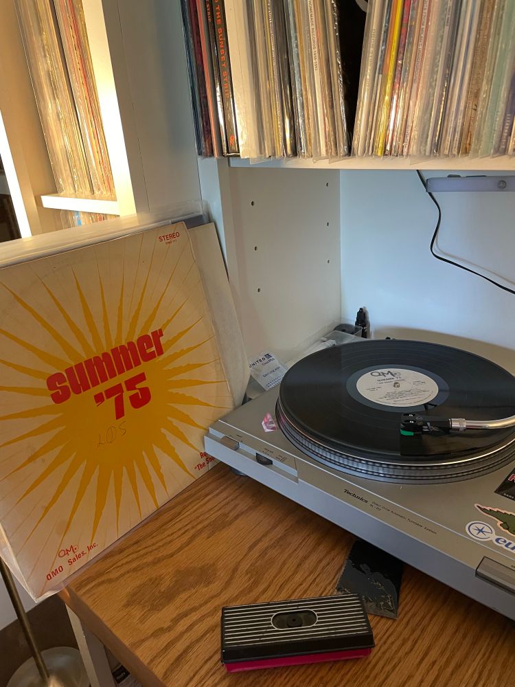 Summer 75 Lp with a record player 