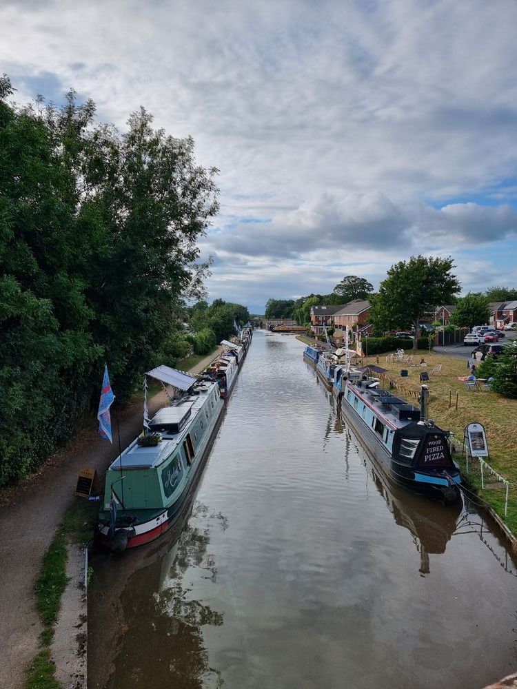 looking along the canal at Market drayton. there is a floating market so there are a lot of boats