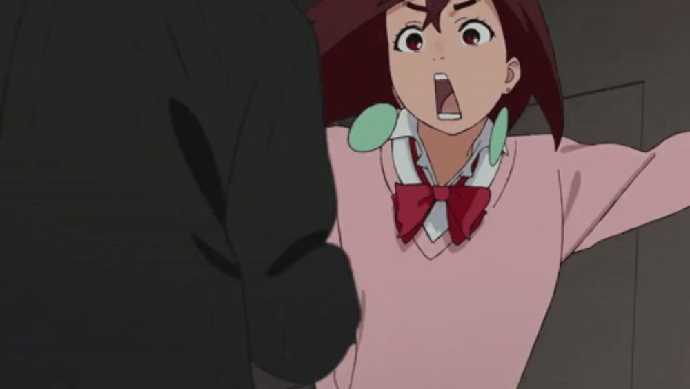 a girl in a pink sweater has her arms outstretched and her mouth open