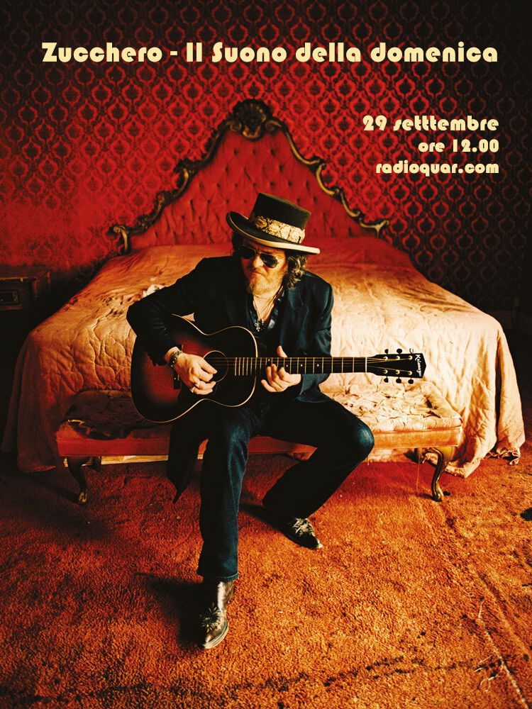 Locandina Monografica Radio Quar con Zucchero fotografato in una stanza rossa che suona la sua chitarra. Ore 12.00